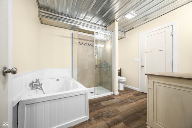5730 S 50 W, Trafalgar, IN 46181 - full bath with a shower stall, a tub with jets, toilet, wood finished floors, and vanity