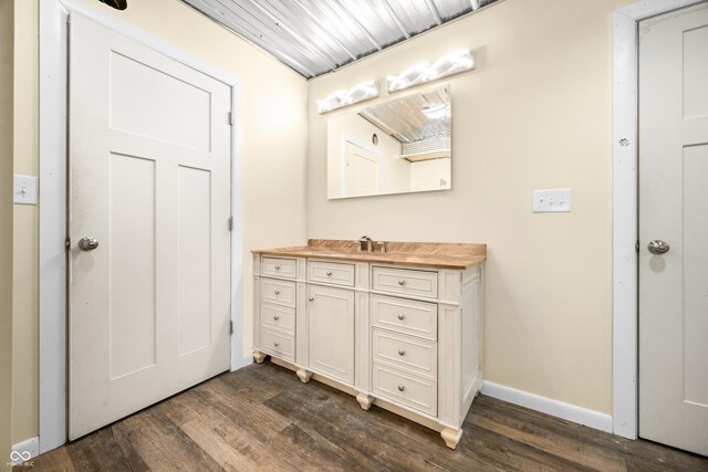 5730 S 50 W, Trafalgar, IN 46181 - bathroom featuring wood finished floors, vanity, and baseboards