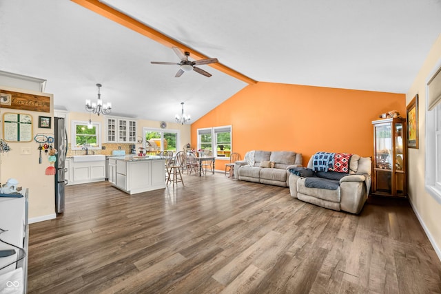 5730 S 50 W, Trafalgar, IN 46181 - living area with a chandelier, dark wood-style flooring, ceiling fan, and baseboards
