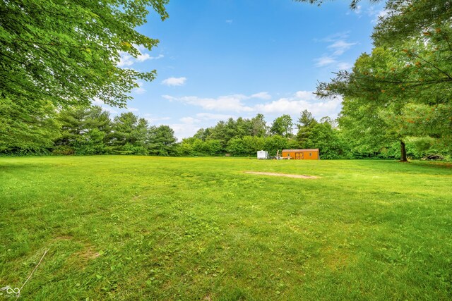 5730 S 50 W, Trafalgar, IN 46181 - view of green lawn featuring an outbuilding