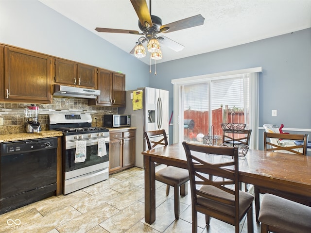 3223 Keystone Lakes Way, Indianapolis, IN 46237 - kitchen featuring appliances with stainless steel finishes, under cabinet range hood, backsplash, lofted ceiling, and ceiling fan