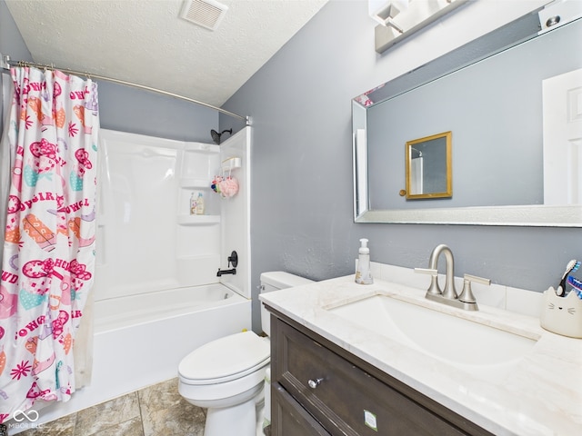 3223 Keystone Lakes Way, Indianapolis, IN 46237 - bathroom featuring toilet, shower / bath combo with shower curtain, vanity, a textured ceiling, and stone finish floors