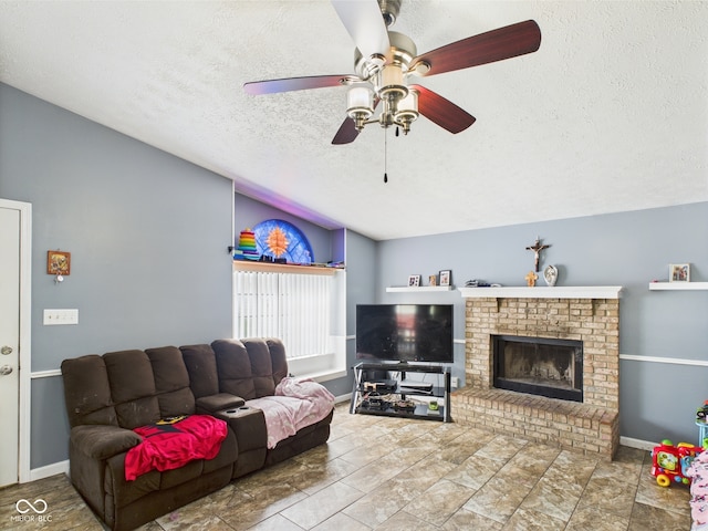 3223 Keystone Lakes Way, Indianapolis, IN 46237 - living room with vaulted ceiling, a textured ceiling, a ceiling fan, a brick fireplace, and baseboards