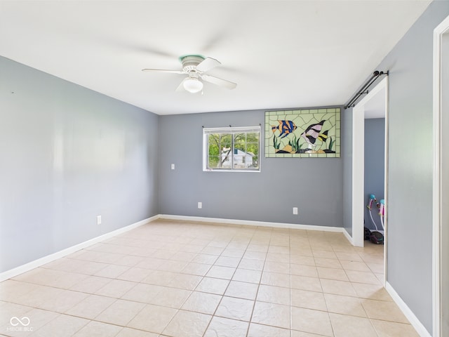3223 Keystone Lakes Way, Indianapolis, IN 46237 - unfurnished room featuring ceiling fan, light tile patterned floors, and baseboards