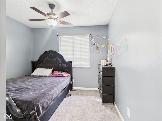3223 Keystone Lakes Way, Indianapolis, IN 46237 - bedroom with carpet flooring, baseboards, ceiling fan, and a textured ceiling