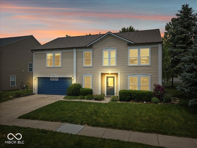 12624 Majestic Way, Fishers, IN 46037 - view of front of property featuring an attached garage, concrete driveway, a front lawn, and a shingled roof
