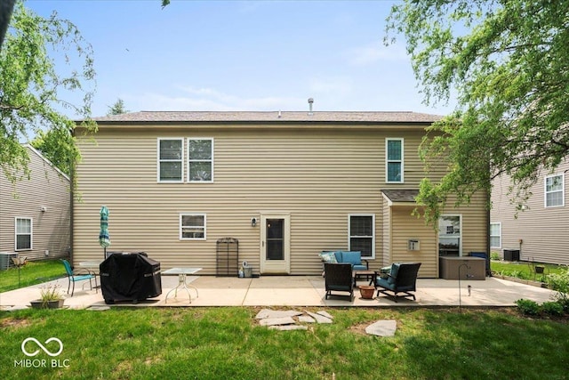 12624 Majestic Way, Fishers, IN 46037 - back of property with a patio, a yard, and outdoor lounge area