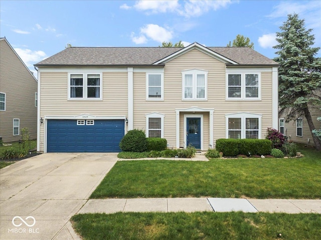 12624 Majestic Way, Fishers, IN 46037 - colonial house with driveway, a garage, a front yard, and roof with shingles