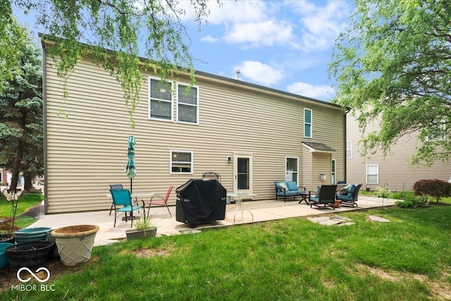 12624 Majestic Way, Fishers, IN 46037 - rear view of house featuring a patio, a yard, and an outdoor hangout area