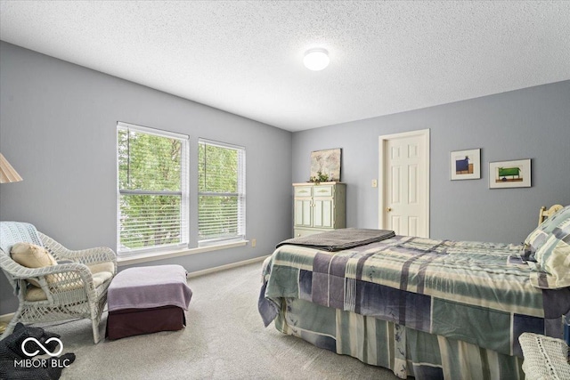 12624 Majestic Way, Fishers, IN 46037 - carpeted bedroom featuring a textured ceiling and baseboards