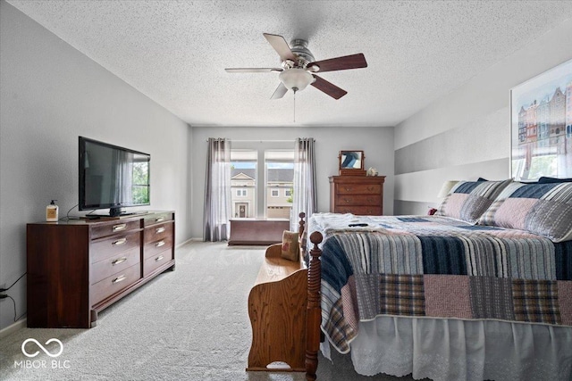 12624 Majestic Way, Fishers, IN 46037 - bedroom featuring light carpet, a textured ceiling, and ceiling fan