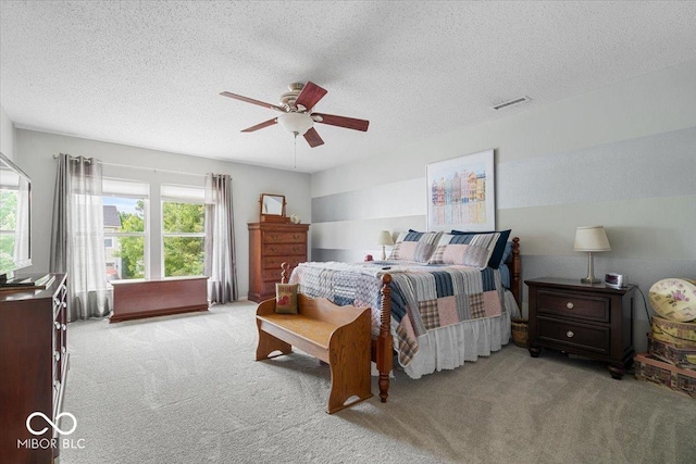 12624 Majestic Way, Fishers, IN 46037 - bedroom with carpet floors, a textured ceiling, and ceiling fan
