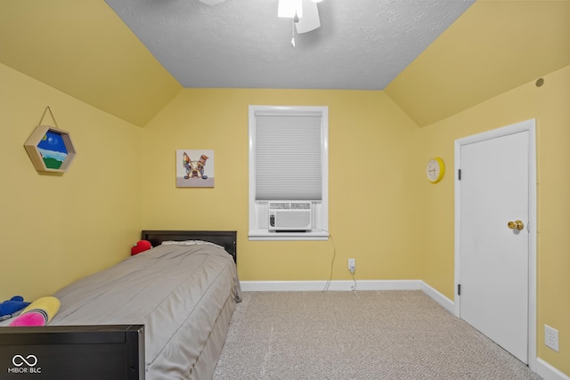 2645 Washington St, Columbus, IN 47201 - bedroom with lofted ceiling, cooling unit, carpet floors, baseboards, and a ceiling fan