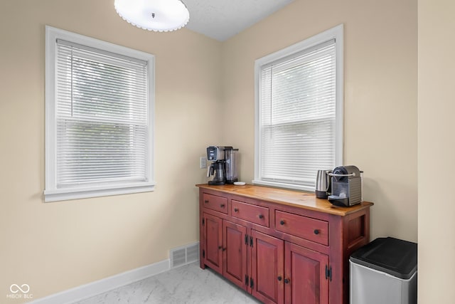 2645 Washington St, Columbus, IN 47201 - home office with light marble finish flooring and baseboards