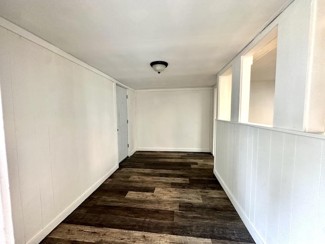 106 S Hancock St, Waynetown, IN 47990 - hallway featuring dark wood-style floors and baseboards
