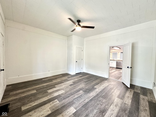 106 S Hancock St, Waynetown, IN 47990 - empty room featuring dark wood-style floors, ceiling fan, and baseboards
