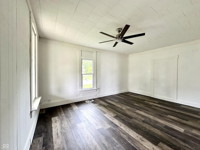 106 S Hancock St, Waynetown, IN 47990 - unfurnished room with dark wood-type flooring, a ceiling fan, and baseboards