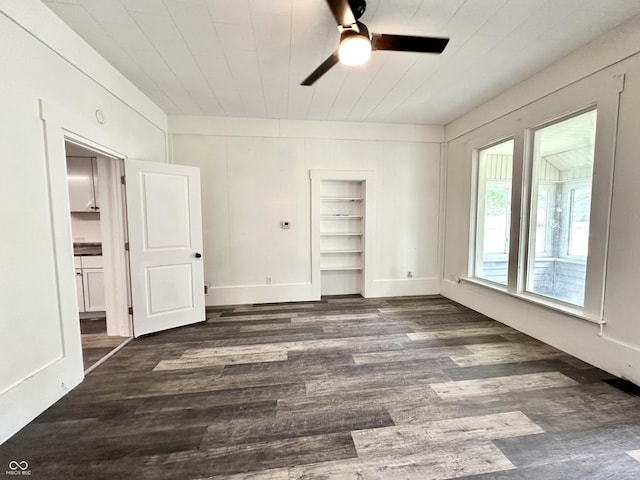 106 S Hancock St, Waynetown, IN 47990 - unfurnished bedroom featuring dark wood-type flooring, a closet, wooden ceiling, and a ceiling fan