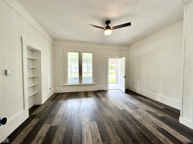 106 S Hancock St, Waynetown, IN 47990 - unfurnished room with ceiling fan, dark wood-style flooring, and baseboards