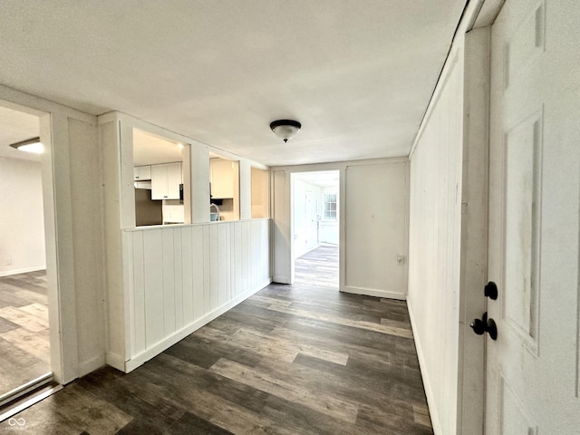 106 S Hancock St, Waynetown, IN 47990 - empty room featuring dark wood-type flooring and baseboards