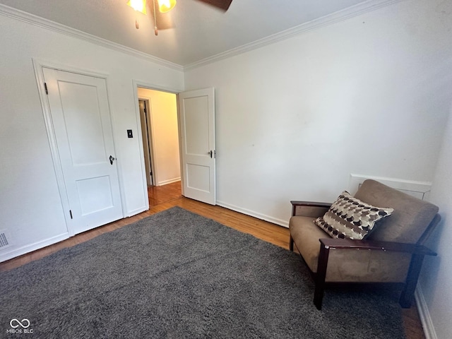 5147 E 16th St, Indianapolis, IN 46218 - unfurnished room with wood finished floors, ornamental molding, a ceiling fan, and baseboards