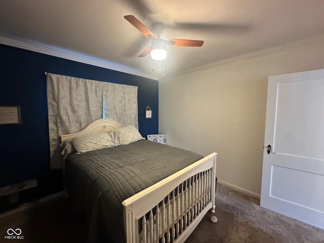 5147 E 16th St, Indianapolis, IN 46218 - carpeted bedroom with ornamental molding, baseboards, and ceiling fan