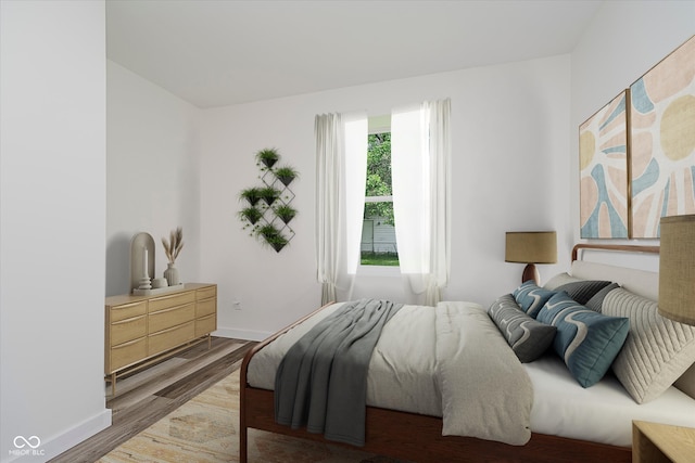 2631 Collier St, Indianapolis, IN 46241 - bedroom with light wood-style flooring and baseboards
