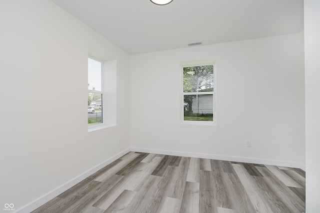 2631 Collier St, Indianapolis, IN 46241 - empty room featuring wood finished floors and baseboards