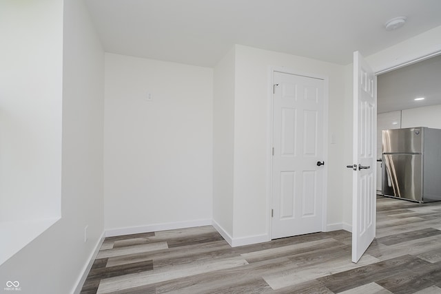 2631 Collier St, Indianapolis, IN 46241 - additional living space with wood finished floors and baseboards