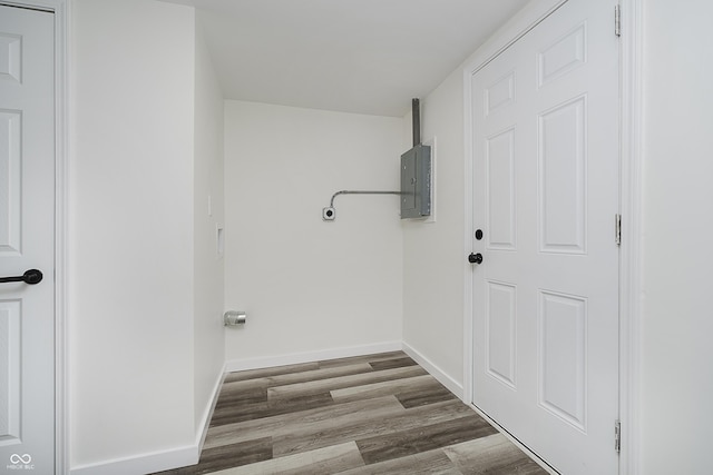 2631 Collier St, Indianapolis, IN 46241 - laundry area featuring electric panel, hookup for an electric dryer, wood finished floors, and baseboards