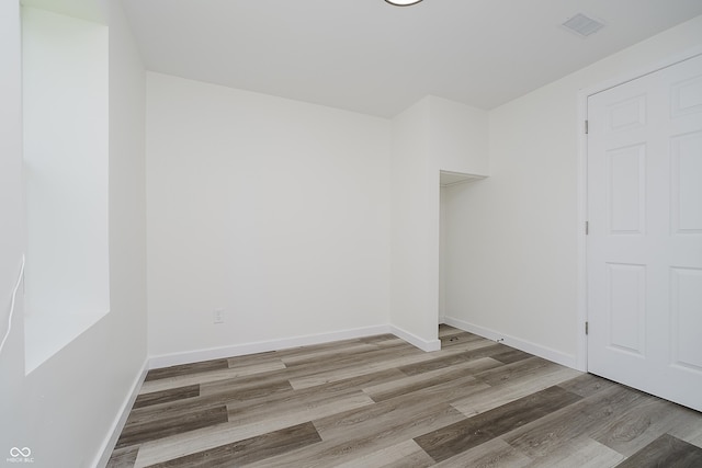 2631 Collier St, Indianapolis, IN 46241 - empty room featuring wood finished floors and baseboards