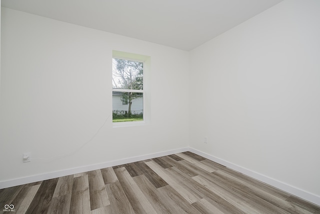 2631 Collier St, Indianapolis, IN 46241 - unfurnished room featuring wood finished floors and baseboards