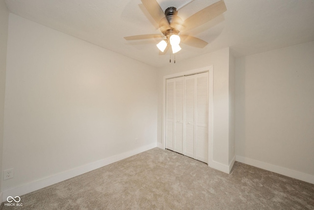 1127 Hickory Ln, New Castle, IN 47362 - unfurnished bedroom featuring carpet, a closet, baseboards, and a ceiling fan