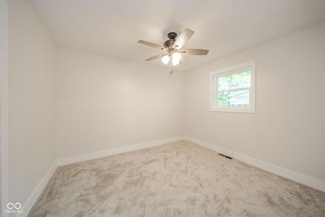 1127 Hickory Ln, New Castle, IN 47362 - carpeted spare room featuring baseboards and a ceiling fan