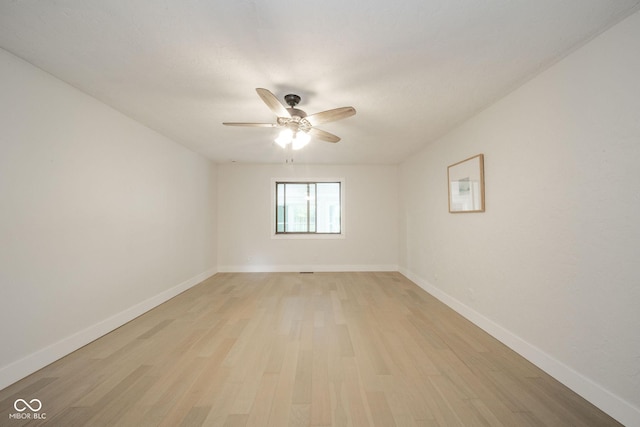 1127 Hickory Ln, New Castle, IN 47362 - empty room featuring light wood-style flooring, ceiling fan, and baseboards