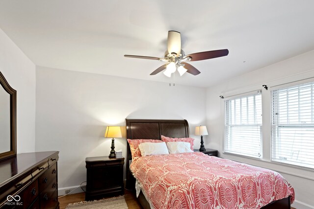 5259 Broadway St, Indianapolis, IN 46220 - bedroom with baseboards, wood finished floors, and ceiling fan