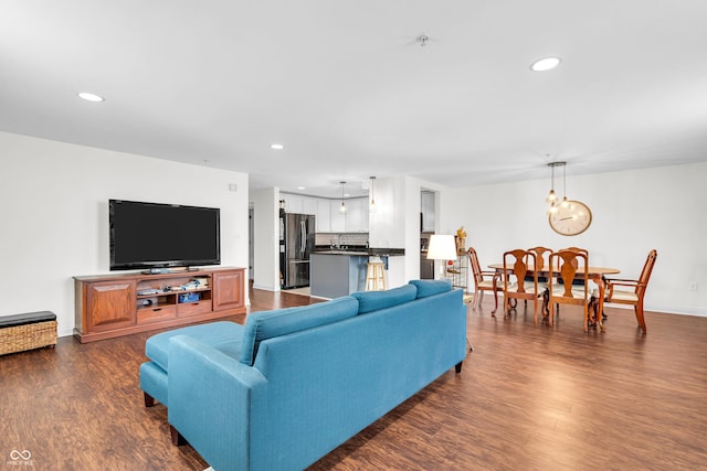 350 N Meridian St Unit 705, Indianapolis, IN 46204 - living area with dark wood-style floors, recessed lighting, and baseboards