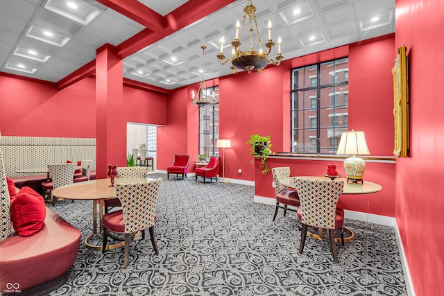 350 N Meridian St Unit 705, Indianapolis, IN 46204 - playroom with coffered ceiling, baseboards, carpet, recessed lighting, and a chandelier