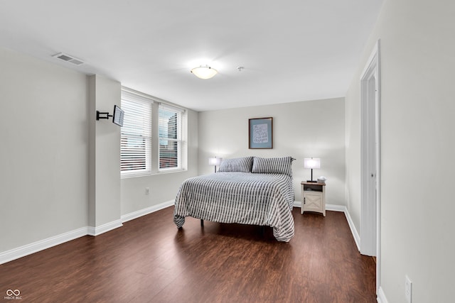 350 N Meridian St Unit 705, Indianapolis, IN 46204 - bedroom with wood finished floors and baseboards