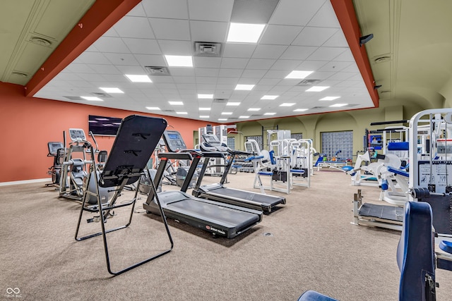 350 N Meridian St Unit 705, Indianapolis, IN 46204 - exercise room featuring a paneled ceiling and carpet flooring