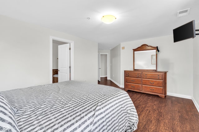 350 N Meridian St Unit 705, Indianapolis, IN 46204 - bedroom with dark wood-type flooring and baseboards