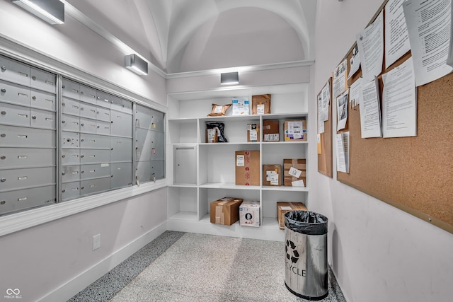 350 N Meridian St Unit 705, Indianapolis, IN 46204 - corridor featuring baseboards, speckle patterned floor, and mail area