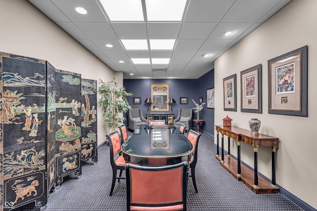350 N Meridian St Unit 705, Indianapolis, IN 46204 - dining room featuring carpet, baseboards, a paneled ceiling, and recessed lighting