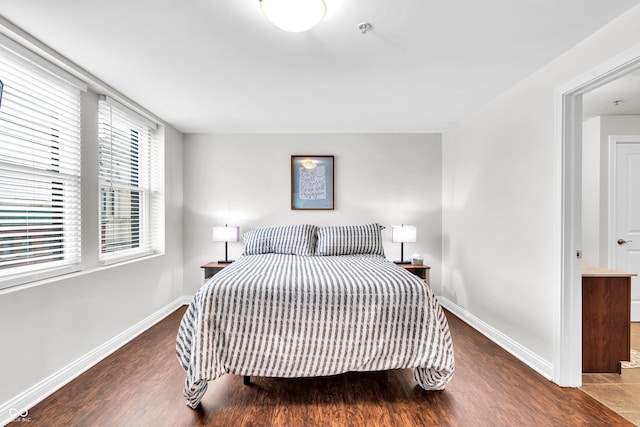 350 N Meridian St Unit 705, Indianapolis, IN 46204 - bedroom with wood finished floors and baseboards