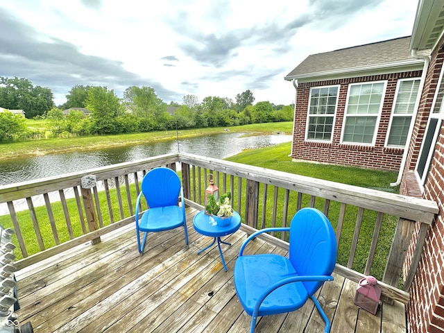 4209 Switchgrass Way, Indianapolis, IN 46237 - wooden terrace with a water view, a lawn, and view of scattered trees