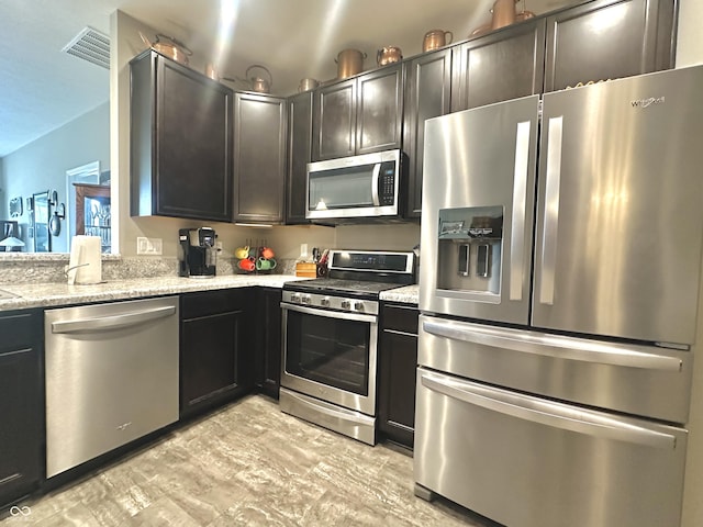 4209 Switchgrass Way, Indianapolis, IN 46237 - kitchen featuring stainless steel appliances and light stone countertops