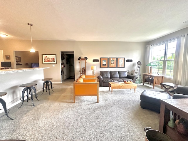 4209 Switchgrass Way, Indianapolis, IN 46237 - living room with light carpet, baseboards, and a textured ceiling