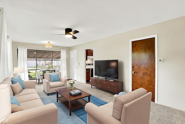 1868 N Hawthorne Ln, Indianapolis, IN 46218 - living area featuring light colored carpet and a ceiling fan