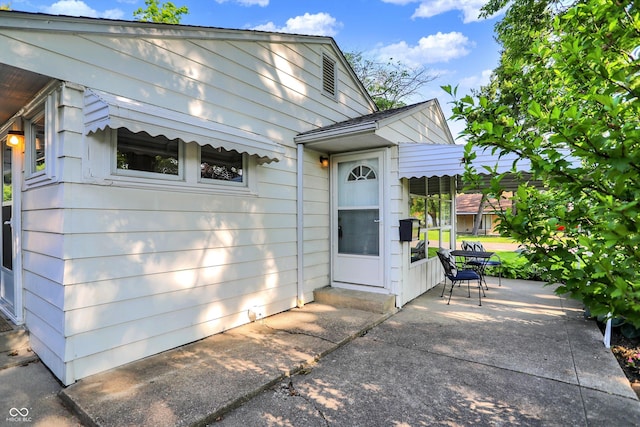 1868 N Hawthorne Ln, Indianapolis, IN 46218 - property entrance featuring a patio