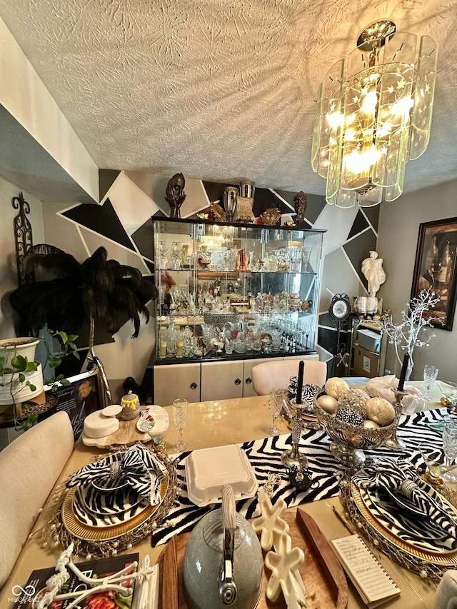 1831 Beckenbauer Ln, Indianapolis, IN 46214 - dining space featuring a textured ceiling, a chandelier, and a bar